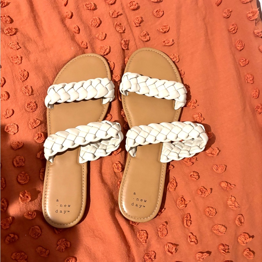Used size 10 white braided flip flops